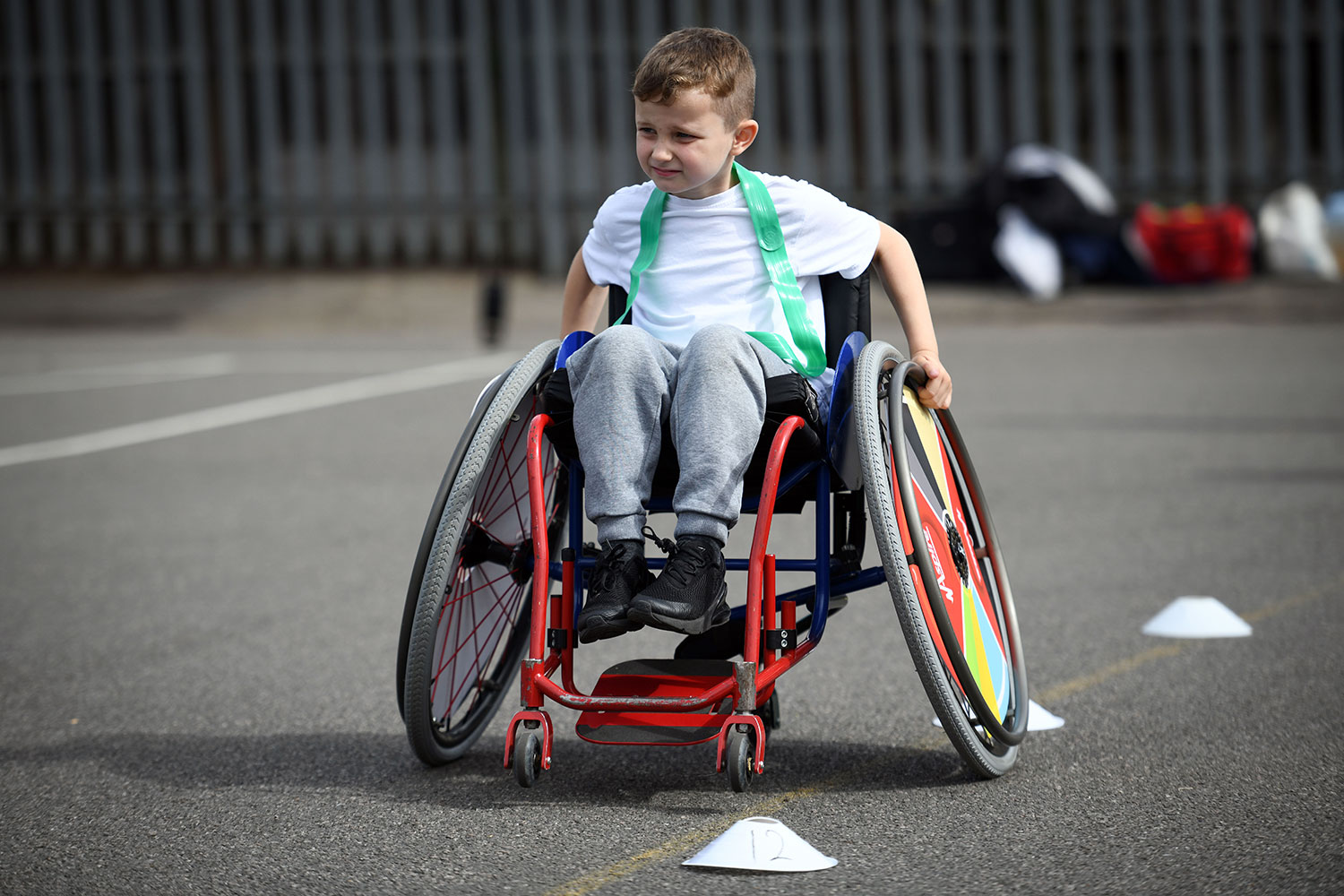 Boy in a wheelchair racing